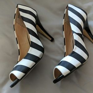 Beautiful practically new Fioni peep toe pumps.